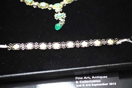 An antique gold and silver, emerald and diamond set demi-parure, necklace 20.5in.